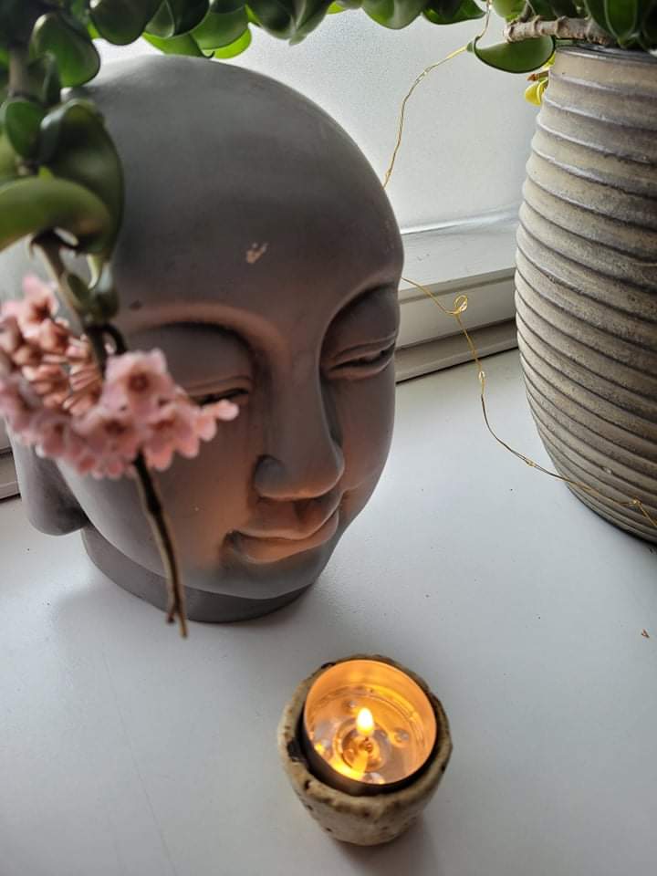 Kiki ind hos Allerød Massage - Budda hoved